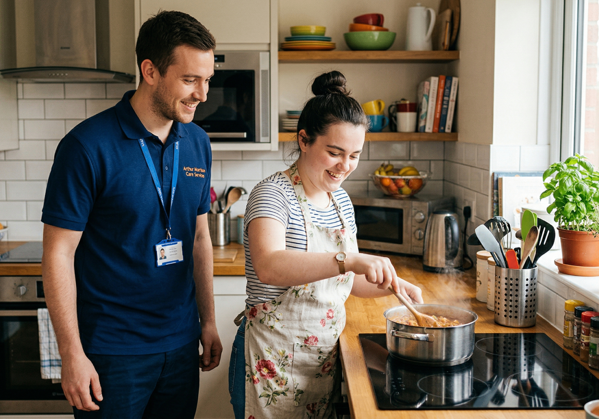 Supported living resident developing cooking skills with Arthur Morrison support worker guidance in East London